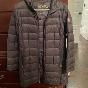Michael kors puffer jacket guc no stains or tears but worn a few times